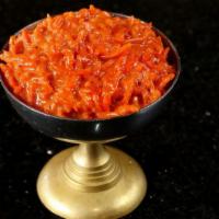 Carrot Halwa · Shredded carrot cooked with sugar and cream.