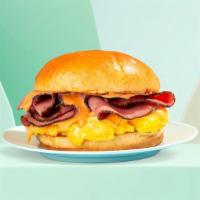 Pastrami, Egg and Cheese Sandwich · Eggs with smoked pastrami and melted cheese.