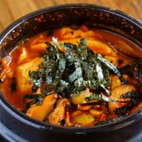 Vegetarian Tofu Soup 야채 순두부 · Soft tofu stew with onion, zucchini, shiitake mushroom, and dried seaweed.