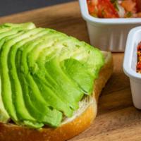 Avocado Toast · Toasted Slice of Bordenave Sour Dough with Avocado served with chili flakes, pico de galo on...