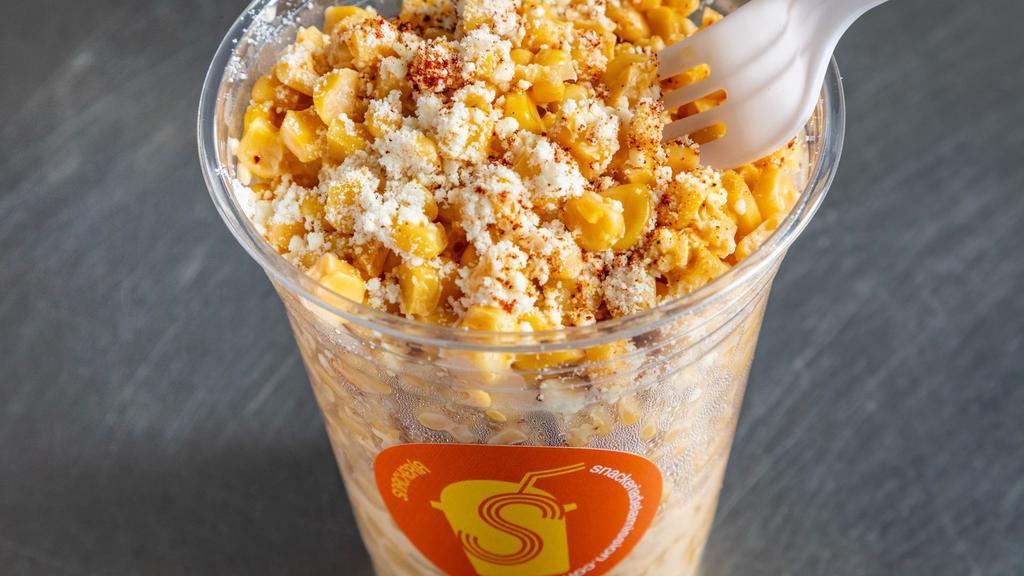 Esquite 16 oz · Cup of corn kernels fresh off the cob mixed with mayo, cotija cheese, tajin, salt, lime & chili powder.