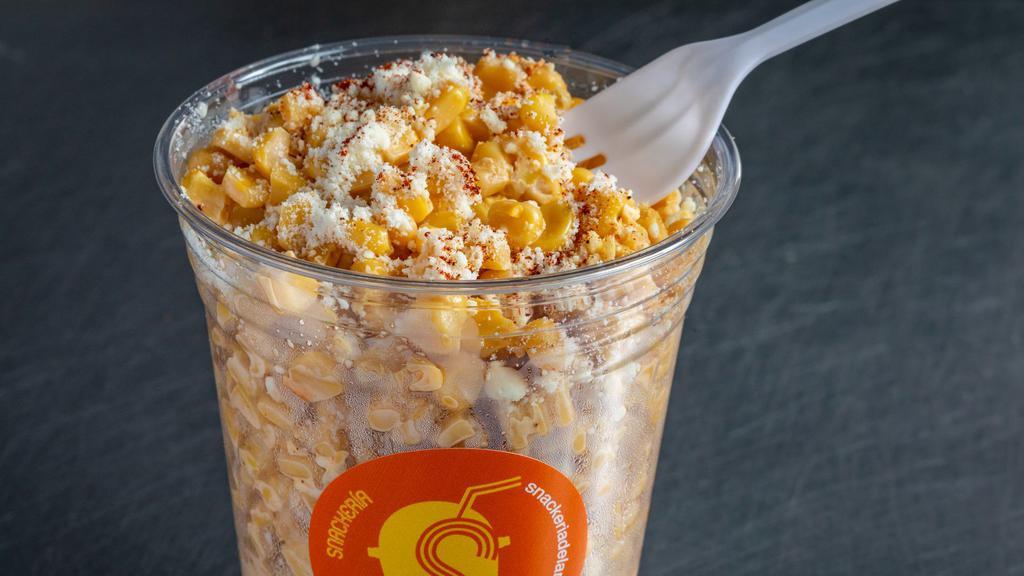 Esquite 12 oz · Cup of corn kernels fresh off the cob mixed with mayo, cotija cheese,  salt, lime & chili powder.