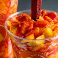 Mangonada 16 oz · 16 oz cup of fresh mango served over a scoop of Fiorello's Mango Sorbetto with chamoy, tajin...