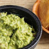 Guacamole & Chips · A heaping scoop of freshly guacamole (avocado, tomato, onion, cilantro, lime juice, salt) wi...