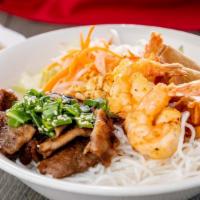 31. House Special Bowl · A bowl with egg rolls, grilled pork, grilled shrimp and grilled mixed meat ball.