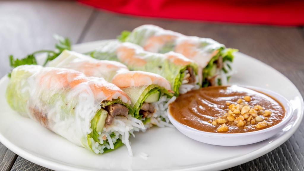 A1-Spring Roll · Fresh roll with shrimp, grilled pork, vermecelli, lettuce, cucumber, and mint wrapped in clear rice paper.