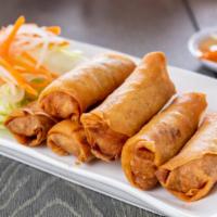 A2-Egg Roll · Deep fried crispy rolls filled with pork, shrimp, taro, carrots, and clear noodles.