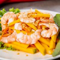A6-Mango Shrimp Salad · Mango cubes and clear noodles mixed with onions in house sauce topped with peanut and coconu...
