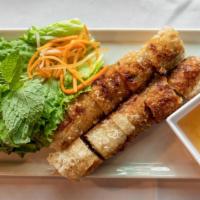 Crispy Imperial Rolls · Filled with glass noodles, pork, chicken, mushrooms and nuoc Cham.