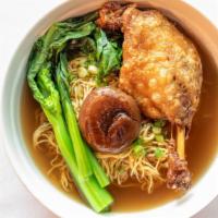 Mi Vit Tiem (Duck) · Duck leg and thigh confit, shitake mushroom, gai LAN and egg noodle.