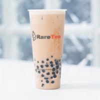 Black Milk Tea · Classic milk tea. Doesn't include toppings. Need to add toppings like boba