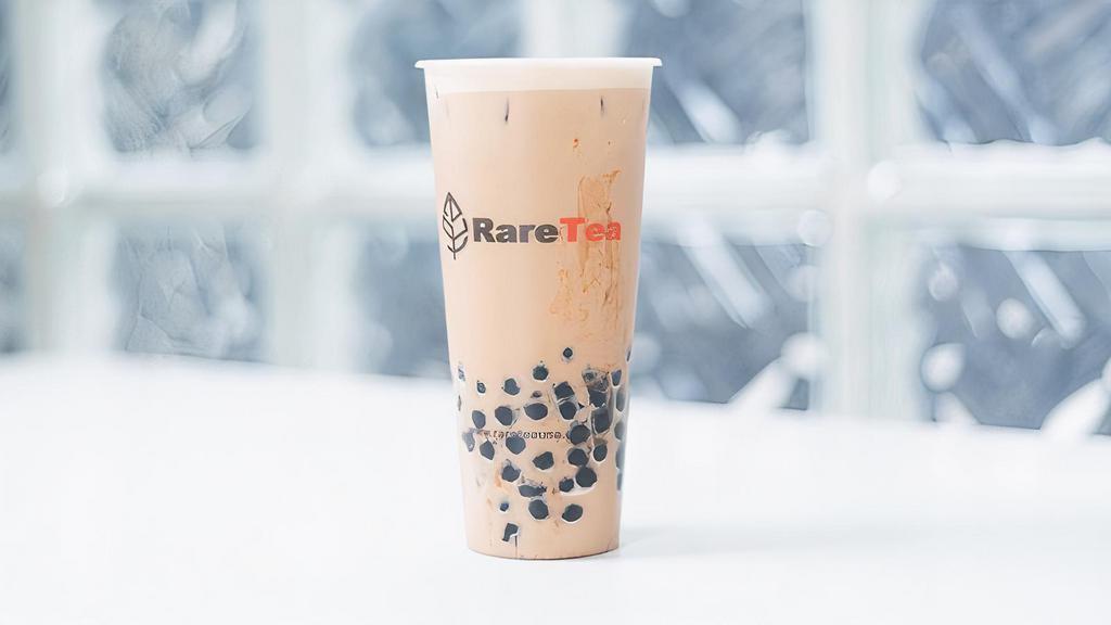 Black Milk Tea · Classic milk tea. Doesn't include toppings. Need to add toppings like boba