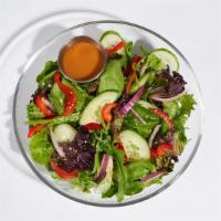 Sesame Ginger Salad · 530-1030 cal.
Spring mix, onions, red bell peppers, and cucumbers topped with sesame seeds.