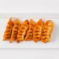 Potstickers (8 Pcs) · 725-744 cal.
Fried dumplings brushed with Soy Garlic, or Spicy. 8 pieces per order.