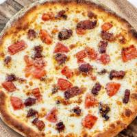 Calabria Pizza · Mozzarella, provolone, pancetta, no tomato sauce. Choose the pie with tomatoes or green oliv...