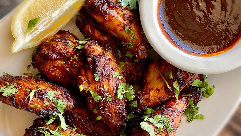 New! BBQ Style Chicken Wings · Roasted in our brick ovens then tossed in our spicy, tangy bbq sauce. Served with your choice of ranch, blue cheese, spicy buffalo ranch dressing, or bbq sauce.