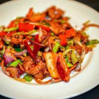 Hunan Lamb · Tender marinated lamb sautéed with fresh leeks, red onion, red bell pepper, and jalapenos wi...