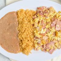 Huevos con Jamón · Three scrambled eggs and diced ham.  Served with beans, rice, and tortilla