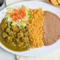 Chile Verde · Tender cut pork in our special green chili sauce. Served with refried beans, rice, and torti...