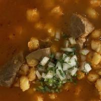 Pozole (pork) · Served with cabbage, radish, onions, lemon, and a side of tostadas