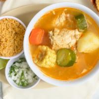 Caldo de Pollo · Chicken soup with vegetables. Served with a side of rice and tortillas