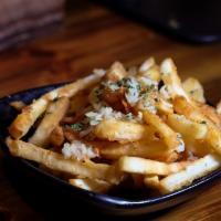 Garlic Fries · Add Melted Cheese for an additional charge.
