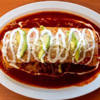 Regular Burrito Mojado Wet · Regular burrito cover with red sauce.