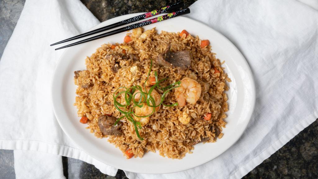 47. Creasian Fried Rice  · Fried​ rice with egg, bean sprout, carrot, cabbage, and onion in house sauce with choice of meat
