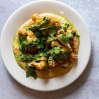 Za'atar Cauliflower & Hummus · Cauliflower florets tossed with za’atar spices, served over chickpea hummus, topped with ses...