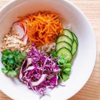 Spring Noodle Bowl · Rice noodles, marinated mushrooms, pickled carrots, red cabbage, cucumber, sliced radish, cr...
