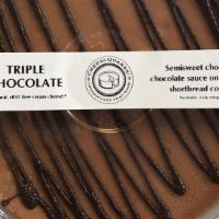 Triple Chocolate small party · Semisweet filling over our chocolate cookie crust with dark chocolate sauce on top.