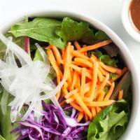 Mixed Green Salad · Organic mixed greens, carrot, onion & red cabbage with house-made no-oil dressing.