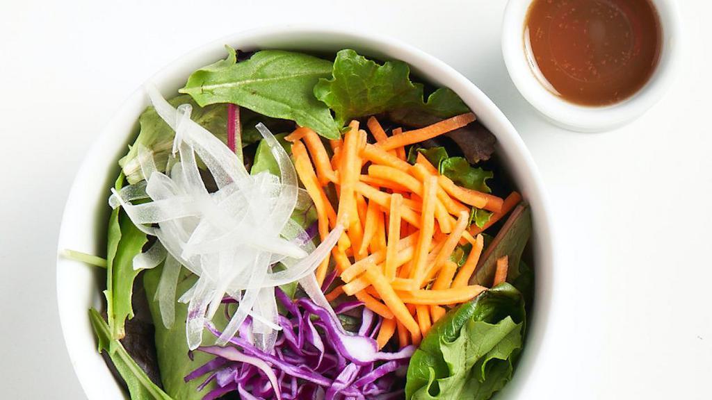 Mixed Green Salad · Organic mixed greens, carrot, onion & red cabbage with house-made no-oil dressing.