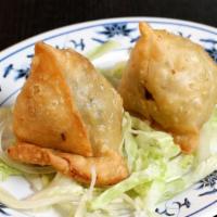 Vegetable Samosa (2 Pieces) · Crispy puffs filled with potatoes and green peas.