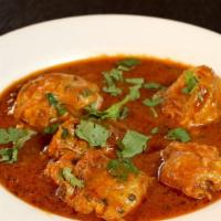 Chicken Curry · Chicken cooked with mild curry sauce and spices.