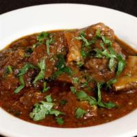 Bhindi Gosht · Okra cooked with lamb.