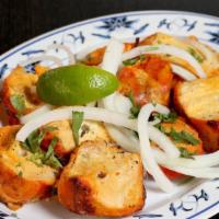 Chicken Boti · Chicken cubes marinated in spices and cooked in clay oven.