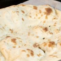 Naan · Wheat bread cooked in clay oven.