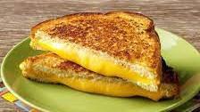 Grilled Cheese · Melted cheddar and american cheese on your choice of bread.