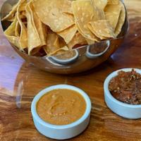 Chips y  Salsas* · Housemade seasonal salsas*

*contains peanuts