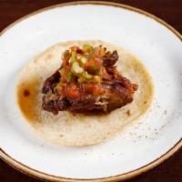 Carnitas · slow roasted pork shoulder, chile fresno salsa, pico de nopal, escabeche