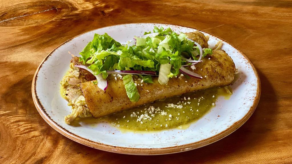 Echiladas · pulled rotisserie chicken, roasted poblano salsa verde, queso fresco, red onion,lettuce, greens, crema
