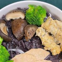 07. Veggie Forbidden Pho · Forbidden black rice noodles with tops of shiitake mushroom, tofu, veggie ham, gobo tempura,...