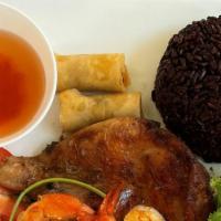 14. Prawns, BBQ Chicken, Imperial Roll · BBQ prawns, chicken, Imperial roll over black rice with vegetables and fish sauce.