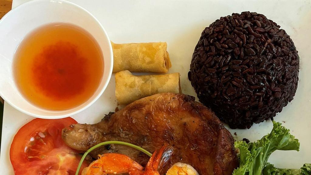 14. Prawns, BBQ Chicken, Imperial Roll · BBQ prawns, chicken, Imperial roll over black rice with vegetables and fish sauce.