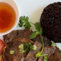17. BBQ Beef · BBQ beef over black rice with vegetables and fish sauce.