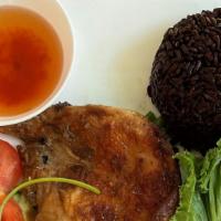 18. BBQ Chicken · BBQ chicken over black rice with vegetables and fish sauce.