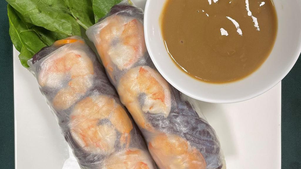 A2. Forbidden Black Rice Shrimp Spring Rolls · Forbidden black rice vermicelli with shrimp, Romaine lettuce, bean sprout, mint and pickled carrot. Serve with spring roll sauce and peanut on the side.