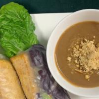 A5. Forbidden Black Rice Tofu Spring Rolls · Forbidden black rice vermicelli with tofu, Romaine lettuce, bean sprout, mint and pickled ca...