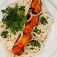 Chicken Kebab · Pieces of boneless, skinless chicken thigh marinated in saffron & house spices